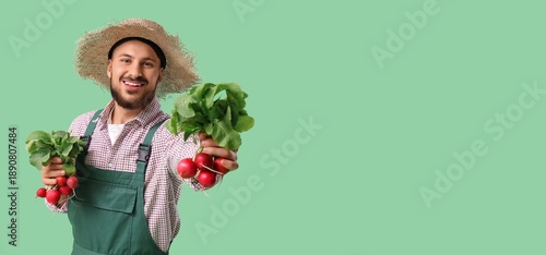 Male farmer holding ripe ra...