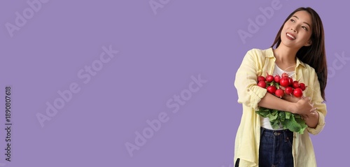 Young Asian woman holding ripe radish on lilac background with space for text