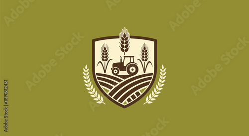 Agricultural emblem with tractor and wheat fields.