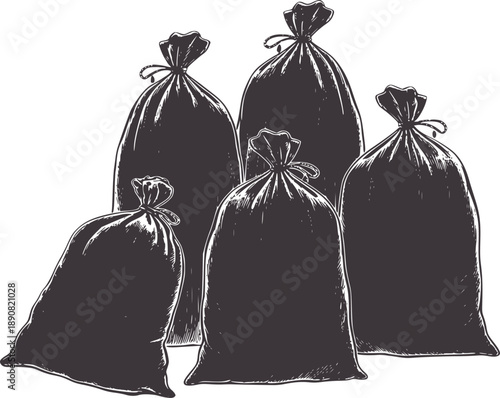 Monochrome of five tied garbage bags in a pile trash waste