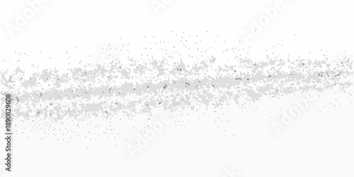A faint horizontal band of scattered dark particles against a white background
