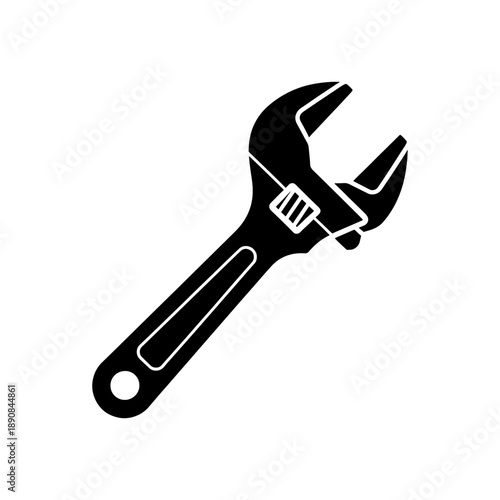 A striking black and white image showcases a single adjustable wrench sharply defined and presented as a bold silhouette high quality professional detailed