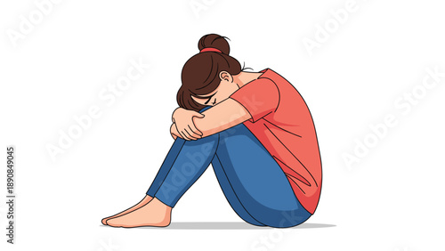 Sad young woman sitting alone on floor with head on knees expressing loneliness depression and emotional distress.