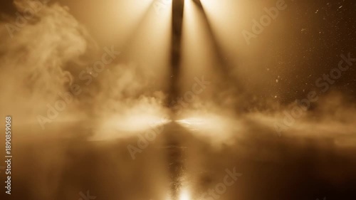 Stylized abstract slow motion view of dramatic golden light shafts penetrating thick morning fog and casting sharp shadows across a polished surface shadows, golden, atmosphere
