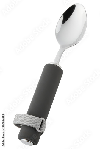 Adaptive stainless steel spoon with thick grey handle isolated on a transparent background