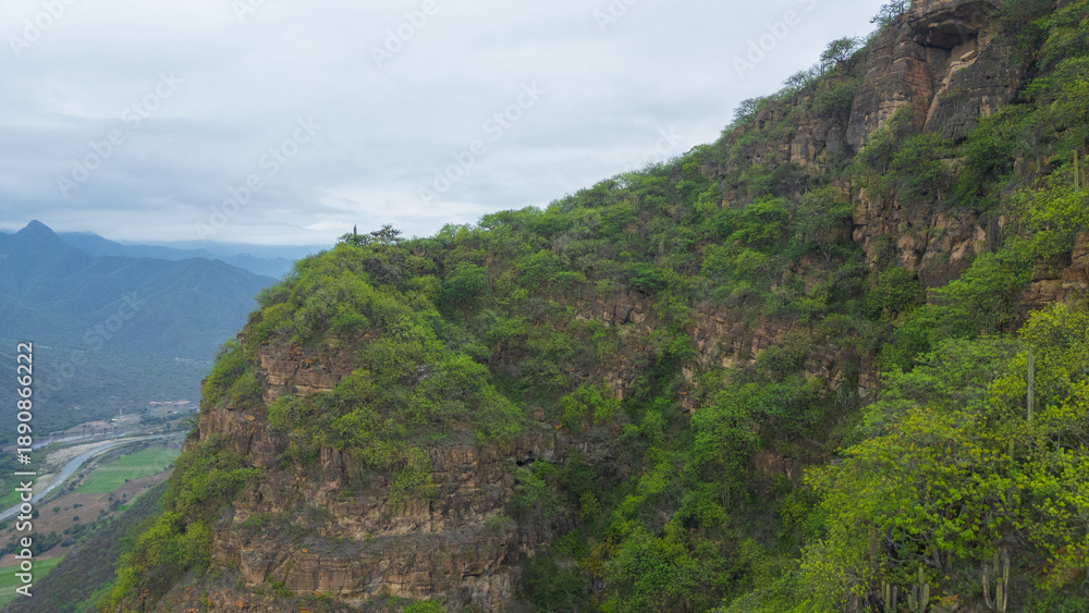 Obraz premium Aerial drone panoramic natural landscapes of Lambayeque, Peru, featuring forests, agricultural fields, and rural scenery near main cities and villages, ideal for tourism, marketing and graphic design