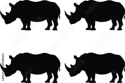 Black rhinoceros silhouette collection in different poses, powerful wild African animal shapes, minimal wildlife illustration isolated on white