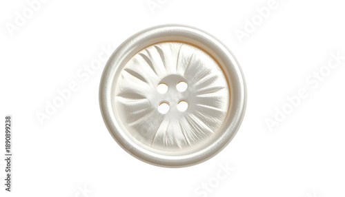 Isolated close-up of a pearlescent button with four holes, centered on black background