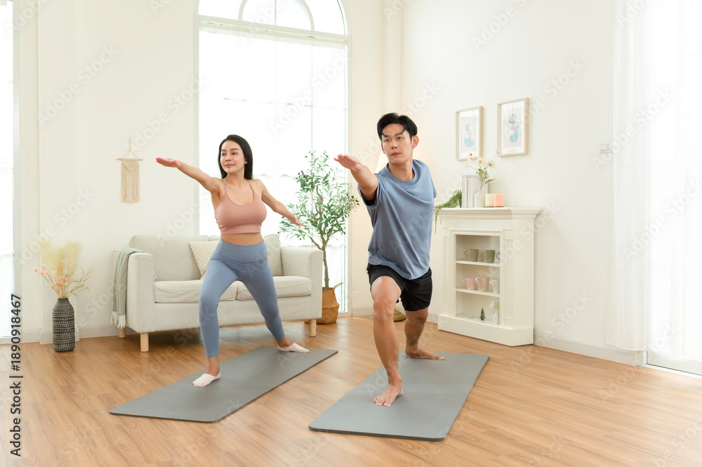 Obraz premium Yoga Practice Session at Home With Two Individuals Engaging in Workout Activities