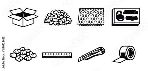 Collection of packaging essentials: box, bubble wrap, ruler, cutter, tape