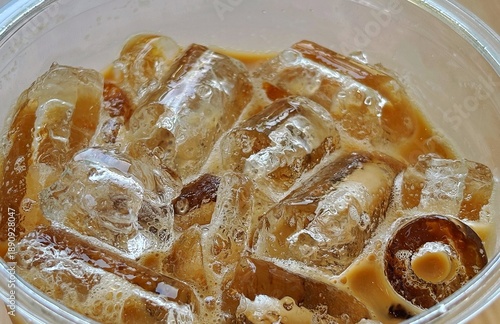 close-up of an iced coffee. cold beverage with a significant amount of ice cubes.