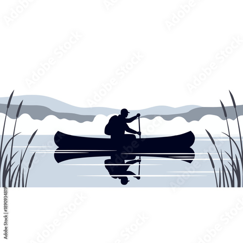 Silhouette of a person kayaking on a calm lake with reflections and hills in the background