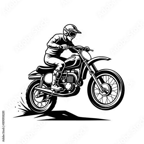 Motocross Rider Performing a Jump on a Dirt Bike.