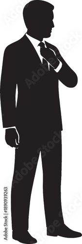 Silhouette of a man in a business suit adjusting his tie