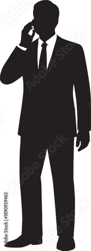 Silhouette of a businessman talking on the phone standing alone