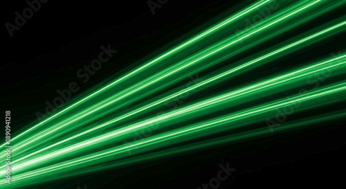 Green laser beams against a dark background.