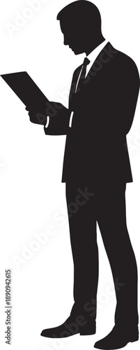 Silhouette of a businessman reading a document standing alone