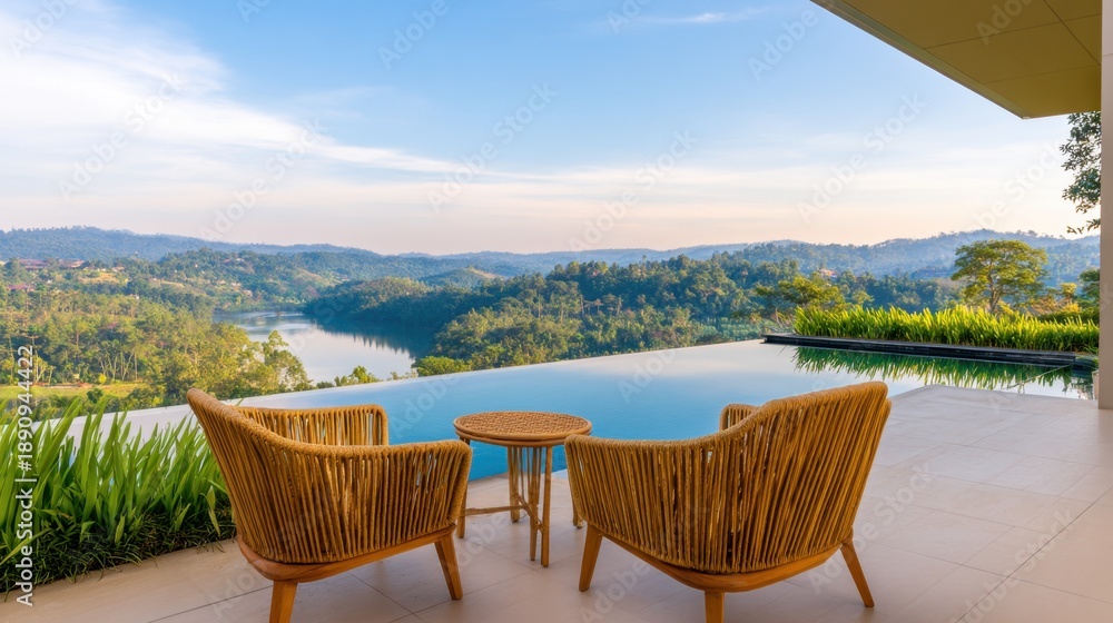 Fototapeta premium Luxurious terrace with wicker chairs overlooks an infinity pool and rolling hills under a clear blue sky today