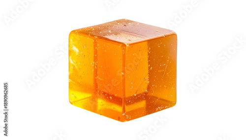 A translucent, amber-colored cube is isolated against a stark black background