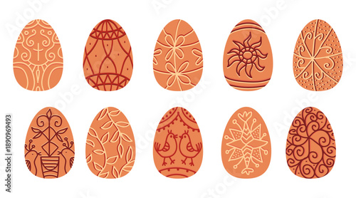 Traditional Easter eggs with folk ornaments. Decorative pysanka, the Ukrainian art of scratching and painting eggs with wax patterns, natural dyes.