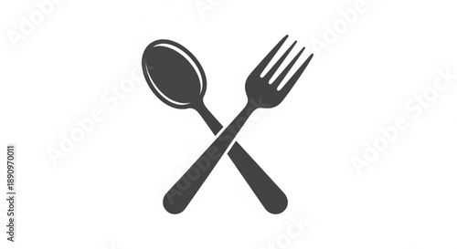 Crossed black fork and spoon on white background symbolizing food dining and utensils
