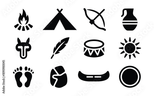Set of black and white icons representing indigenous culture and wilderness survival: campfire, teepee, bow, jug, animal totem, feather, drum, sun, footprints, and canoe.