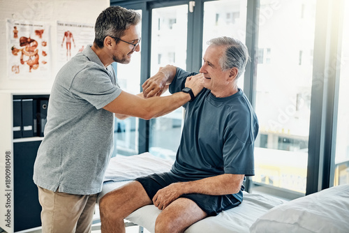 Senior man, physiotherapist and stretching shoulder for assessment, mobility and injury recovery. Mature person, elderly patient and help with stiff joints, physical therapy and muscle rehabilitation