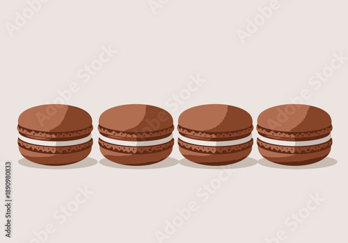 Four chocolate macarons aligned in a row on a plain background viewed from directly above