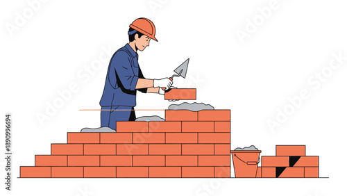 Construction worker building brick wall with trowel and hard hat on white background