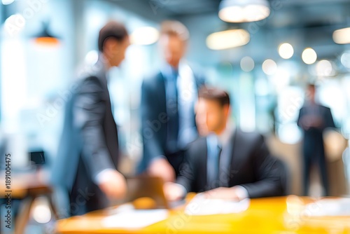 Businessmen blur in the workplace in office with computer or shallow depth of focus of abstract background. High quality