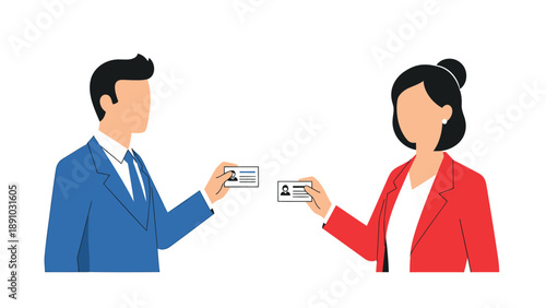 Businessman and businesswoman exchanging identification cards in formal attire