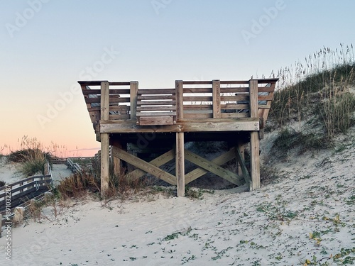 A wooden viewing deck over the dunes at Ocracoke beach, North Carolina.