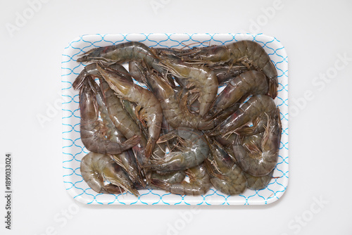Raw Shrimp in Foam Tray Isolated on White Background