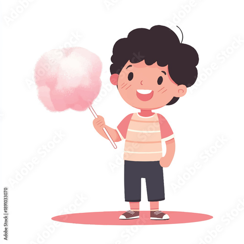 Smiling boy holding pink cotton candy