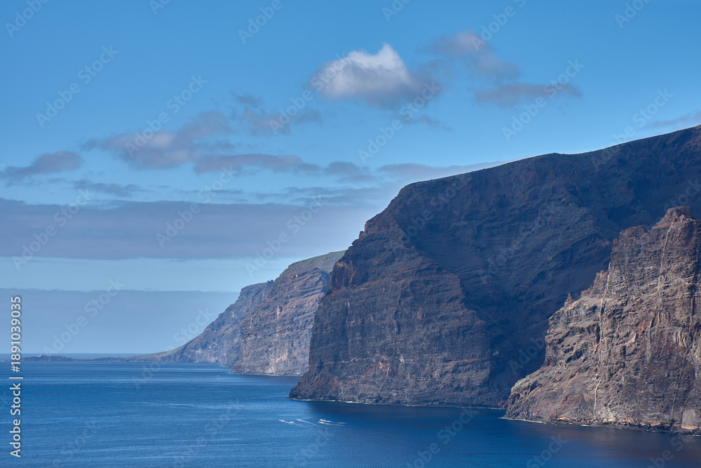 Fototapeta premium Panoramic views of the stunning Cliffs of Los Gigantes at sunset on the island of Tenerife