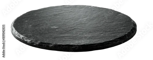 Obraz  z motywem A close-up, isolated image of a dark gray, circular serving slate plate on a black background