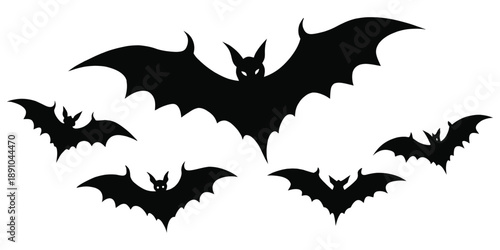 A formation of five black silhouette bats in flight against a transparent background, creating a spooky atmosphere for Halloween.