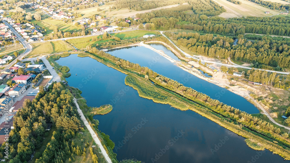 Fototapeta premium Drone shot of a winding lake shoreline