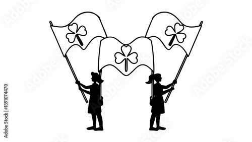 Two silhouetted figures holding flags with shamrocks in a celebratory gesture