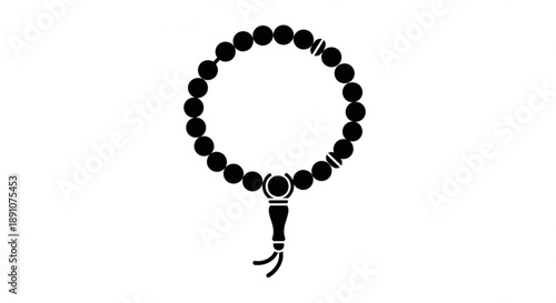 Black beaded bracelet with tassel on white background simple fashion accessory