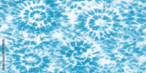 A vibrant blue abstract background features a floral fractal pattern with glowing stars and purple light rays exploding across a dark space texture