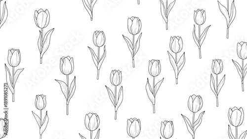 Seamless pattern of hand drawn black and white tulip flowers on stems with leaves scattered across a white background for floral themes.