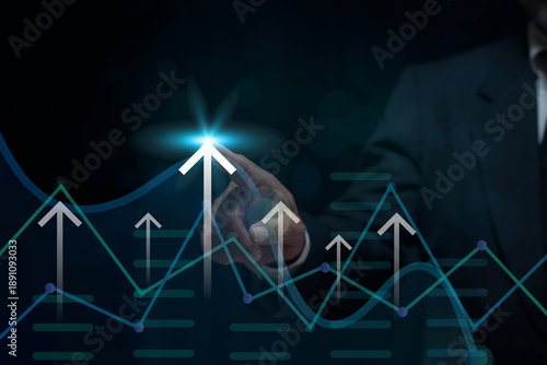 Businessman hand reaching towards upward arrows. Analysis finance grow graph and market investment. Financial  business plan, earnings, sale and strategy. stock, market, invest