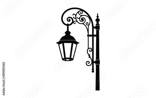Elegant victorian style street lamp post with ornate ironwork and lantern