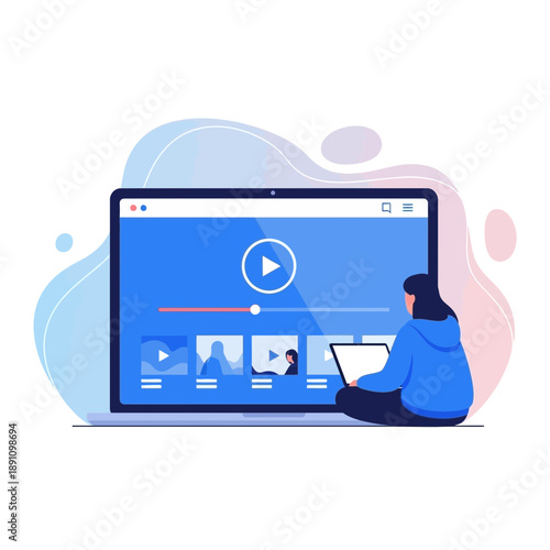 Woman sitting in front of a large computer monitor watching a video on a blue background