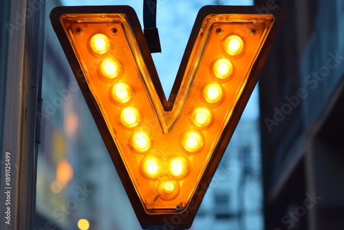 Letter -v- with light bulbs.