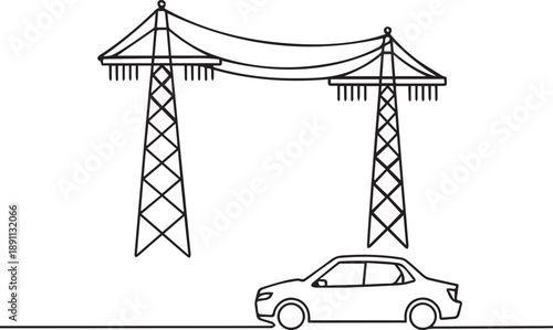 Power lines and towers near a car on the roadside viewed from the side