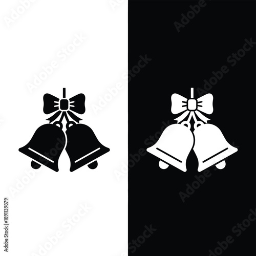 Iconic set of two classic jingle bells tied with a decorative holiday bow icon