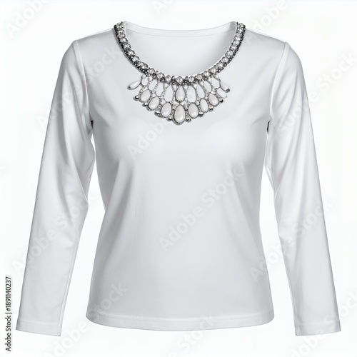 Elegant white long-sleeve top embellished with a statement necklace on clean background