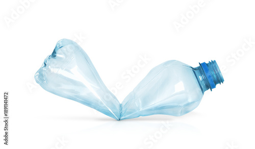 Photos blue plastic crumpled bottle is insulated on a transparent background